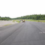 New asphalt south of 111A, tapering into Southbound I-93