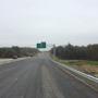 Nothbound new pavement, overhead sign, and guardrail, facing North - 11/17