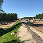 Northbound stabilized slope and Detention Pond progress - 07/17